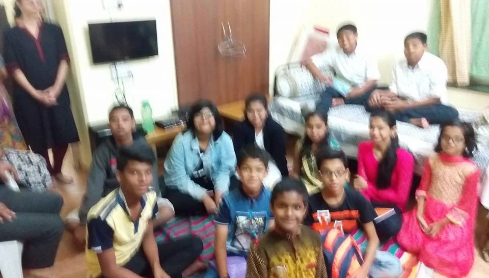 Dr. Naveen Raina, psychiatrist, life coach, and meditation practitioner, smiling in professional attire, representing holistic wellness, life coaching, and mental health guidance.