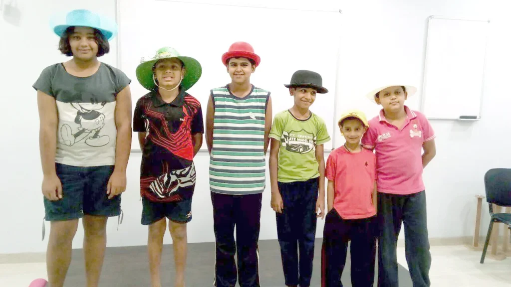 Dr. Naveen Raina, psychiatrist, life coach, and meditation practitioner, smiling in professional attire, representing holistic wellness, life coaching, and mental health guidance.