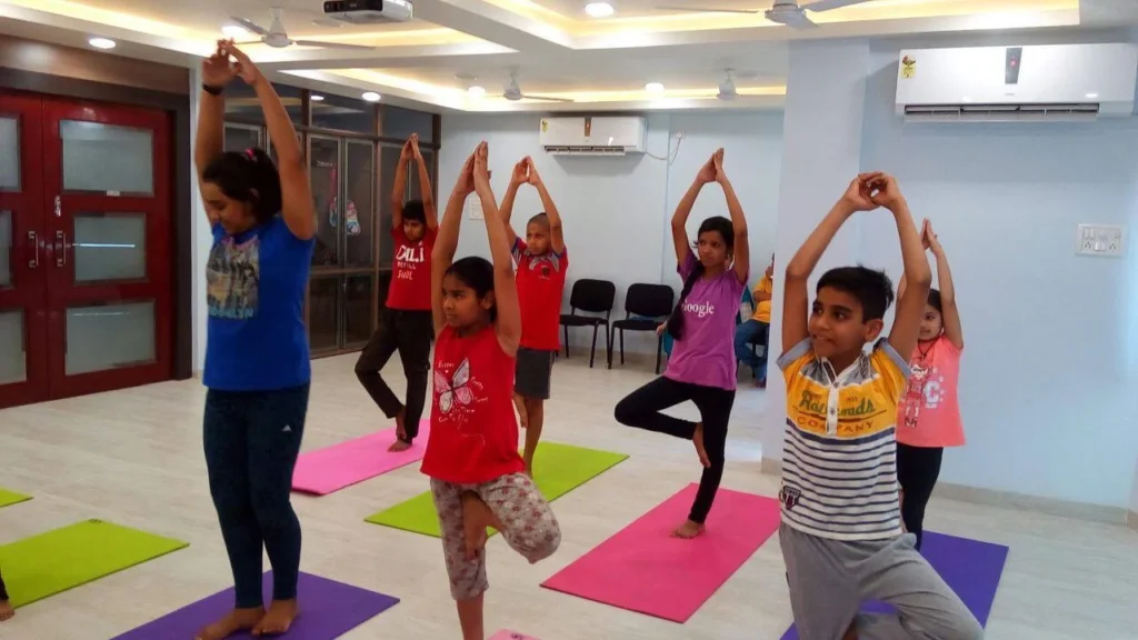 Dr. Naveen Raina, psychiatrist, life coach, and meditation practitioner, smiling in professional attire, representing holistic wellness, life coaching, and mental health guidance.